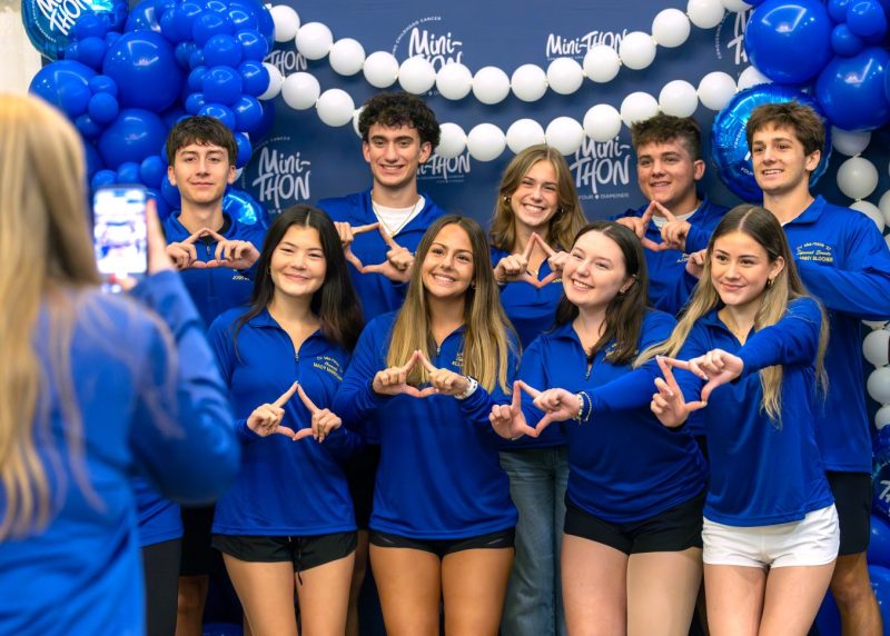 Mini-THON student leaders pose together for a photo at the 2026 Mini-THON Leadership Summit in Hershey, forming Four Diamonds symbols with their hands.