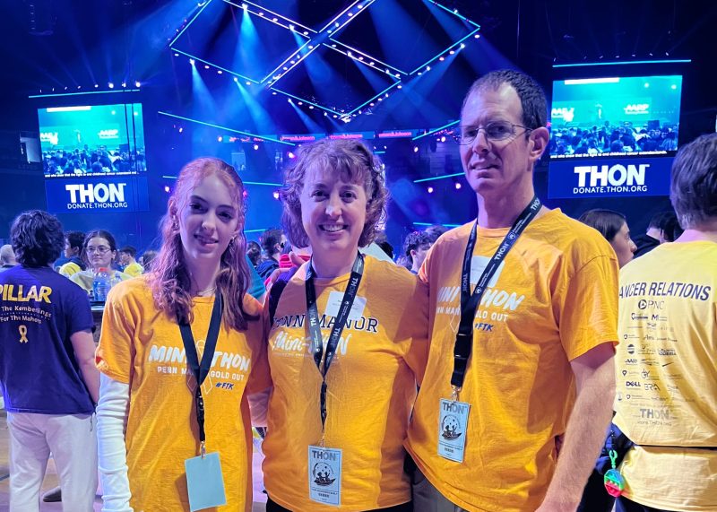 Four Diamonds child Daisy poses with her parents during Penn State THON Weekend.